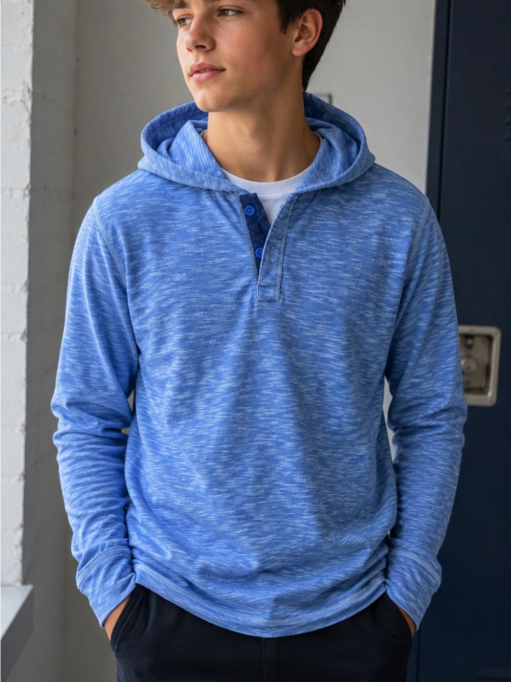 H&M L.O.G.G. light blue marled henley hoodie features a button-up neckline.